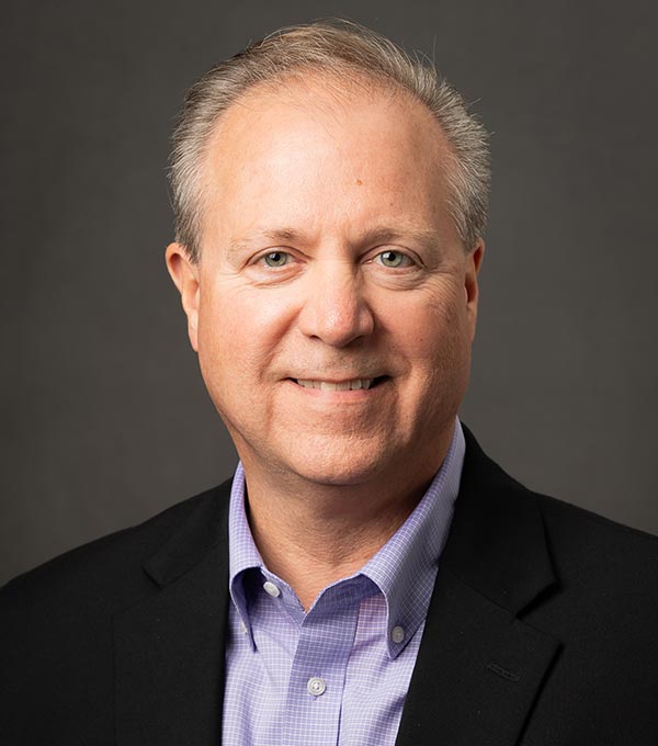 Headshot of Greg Harris.