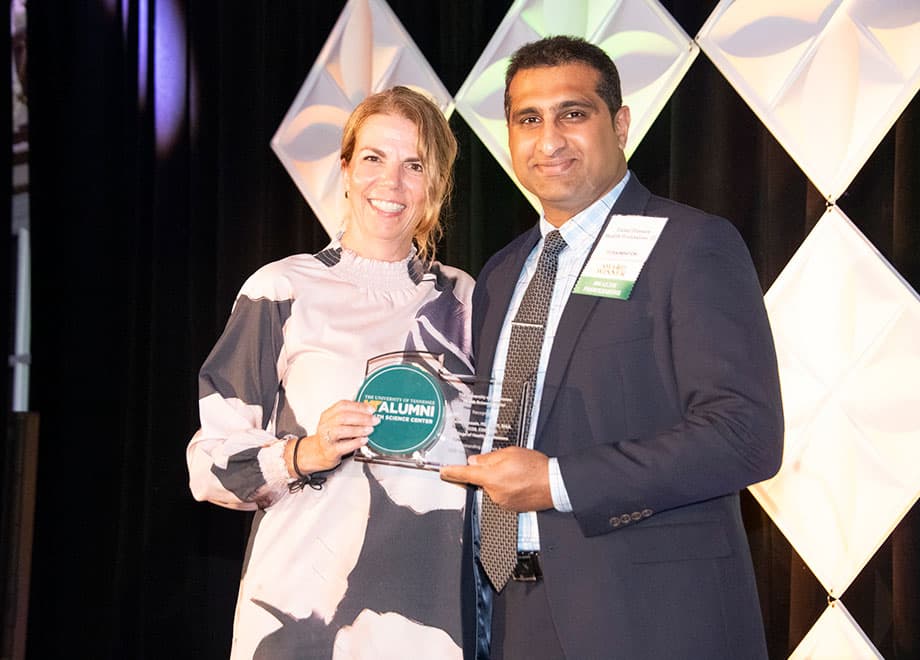 hussain-faisal-2026-health-professions-outstanding-alumnus-award Dr. Faisal Hussain accepting the Health Professions Outstanding Alumnus Award.